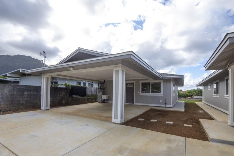 Finished home exterior with covered carport and entryway from an Atlas Construction renovation in Honolulu